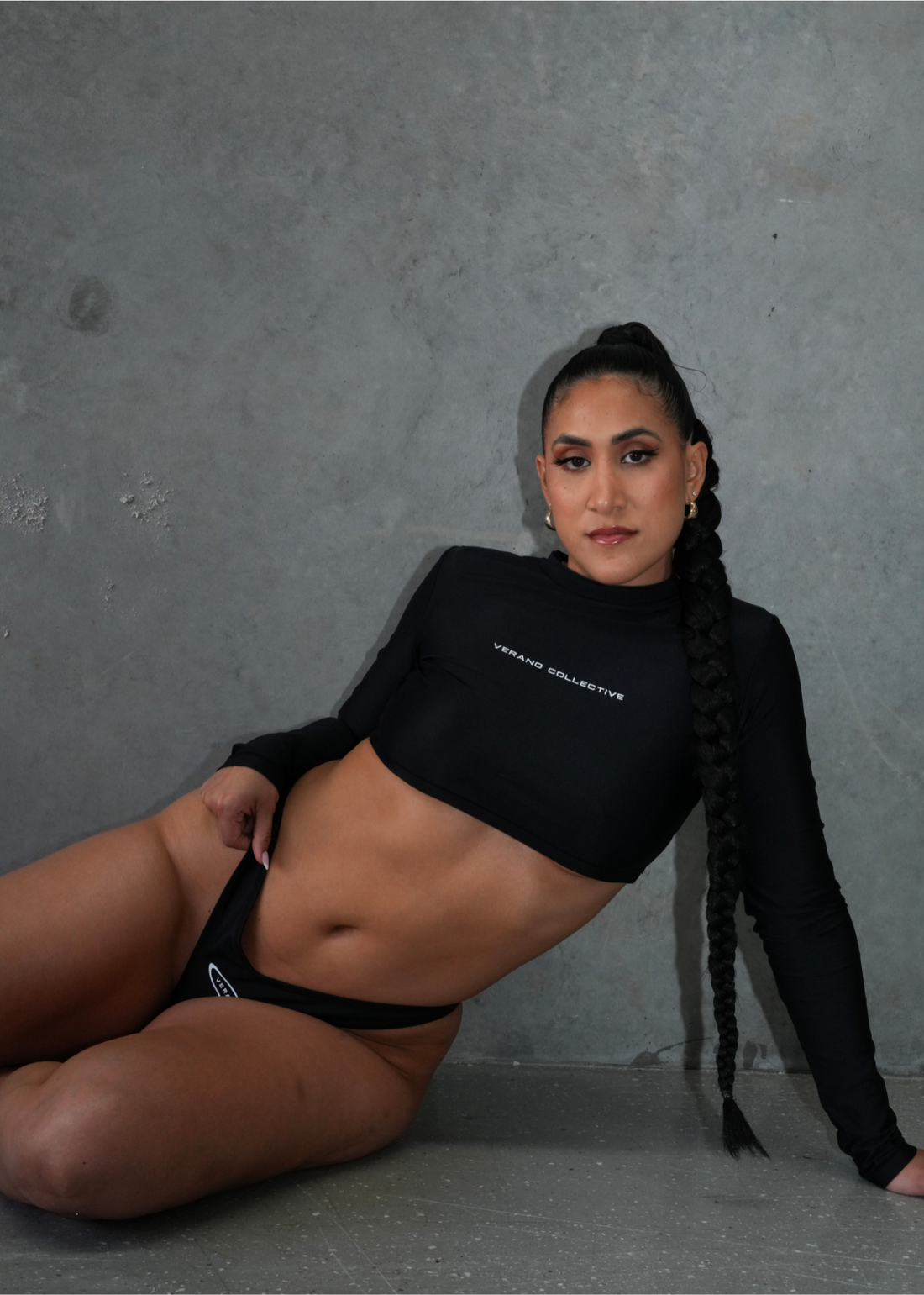 black cropped long sleeve swim top